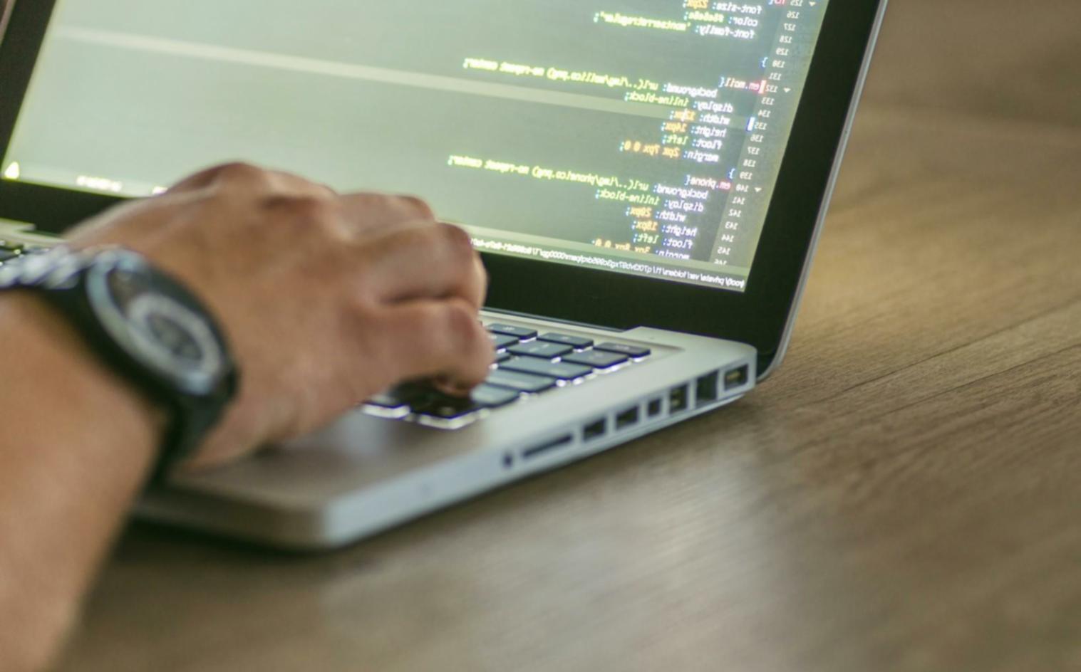 Team member configuring chatbot response logic for client deployment